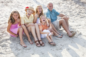familyvacationbeach-300x200 Children with grandparents on beach