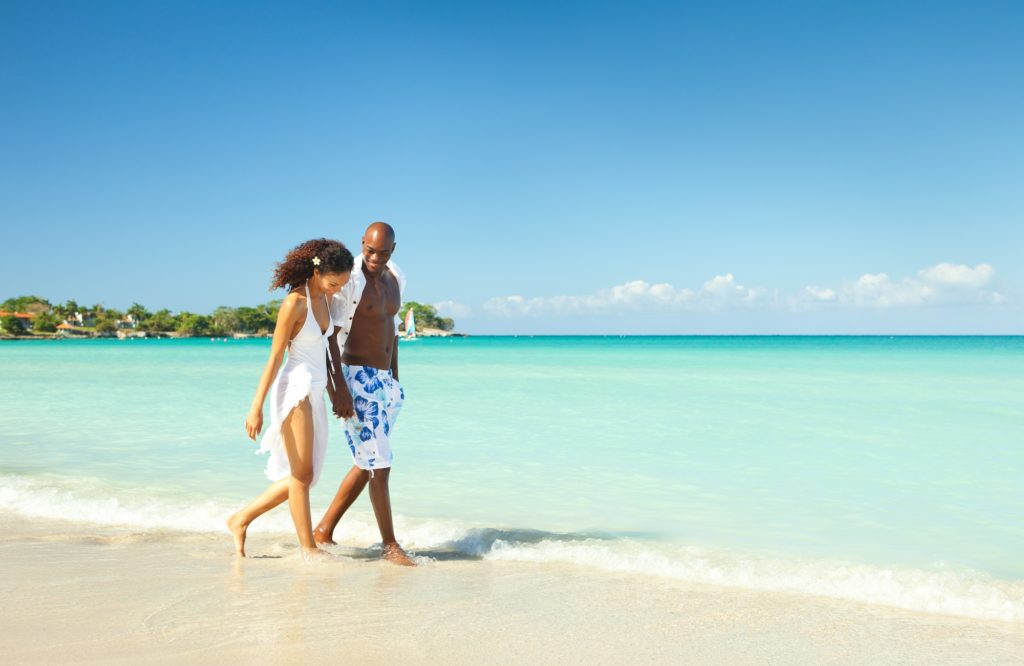 Couple Walking on the Beach in the Caribbean