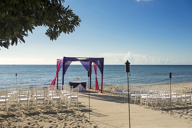 Beach wedding ceremony at Iberostar Selection Cancun in Mexico