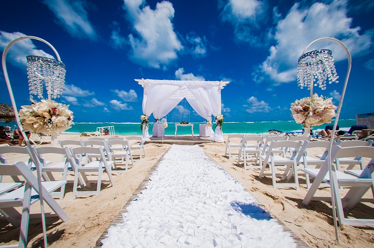 Beach wedding ceremony at Luxury Bahia Principe Sian Ka'an in Riviera Maya