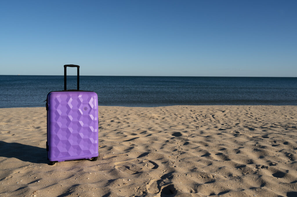 Suitcase on beach in Mexico